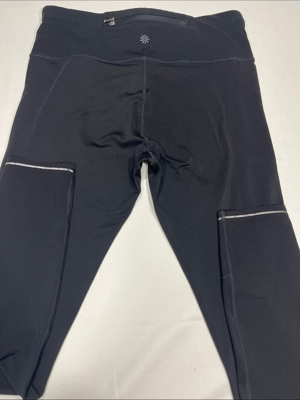 Athleta ST Black 7/8 Leggings Reflective Trim Zip Pocket Tall - Picture 7 of 8